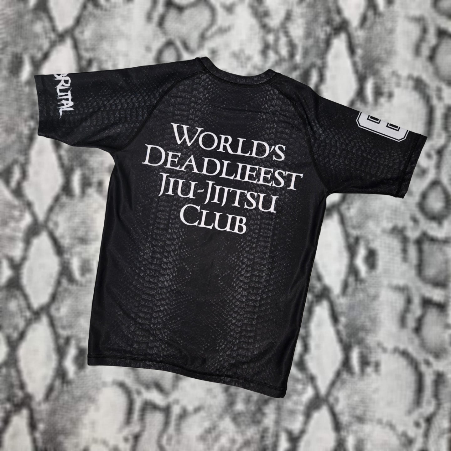 Brutal Cuddlers Black Snake Rash Guard