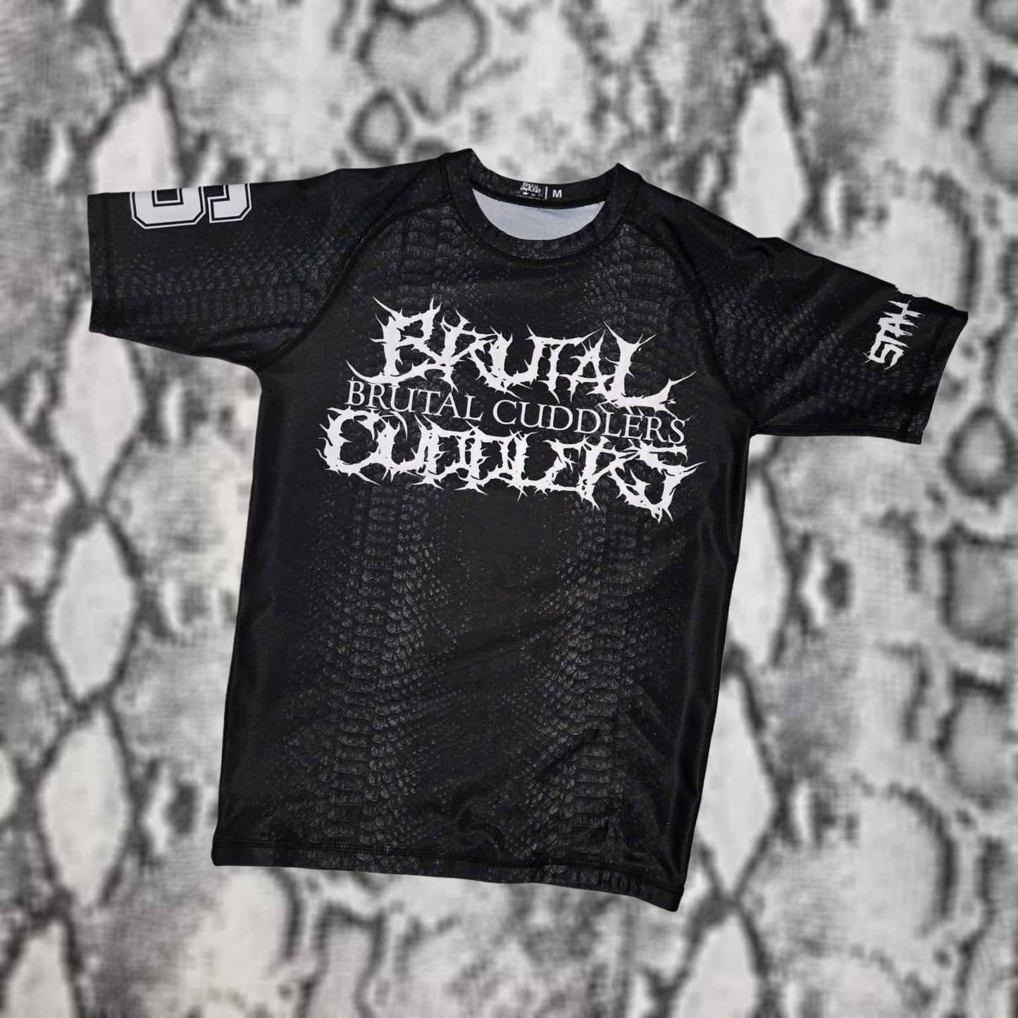 Brutal Cuddlers Black Snake Rash Guard