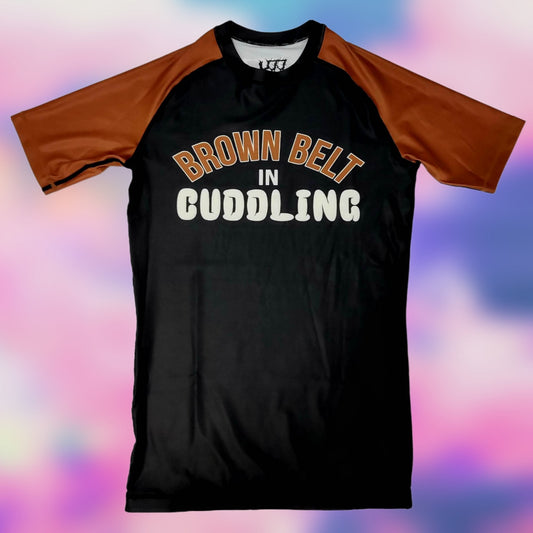 Brown Belt In Cuddling Rash Guard