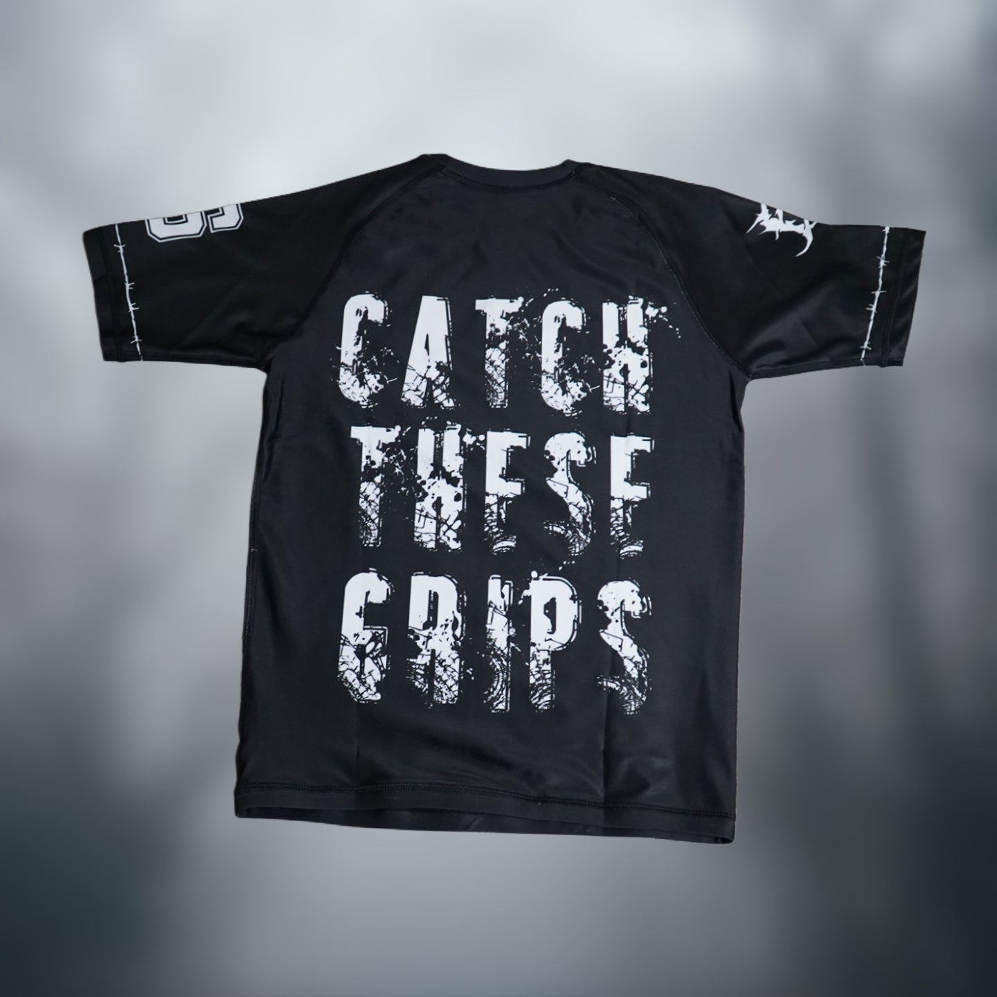 "Catch These Grips" Short Sleeve Rash Guard